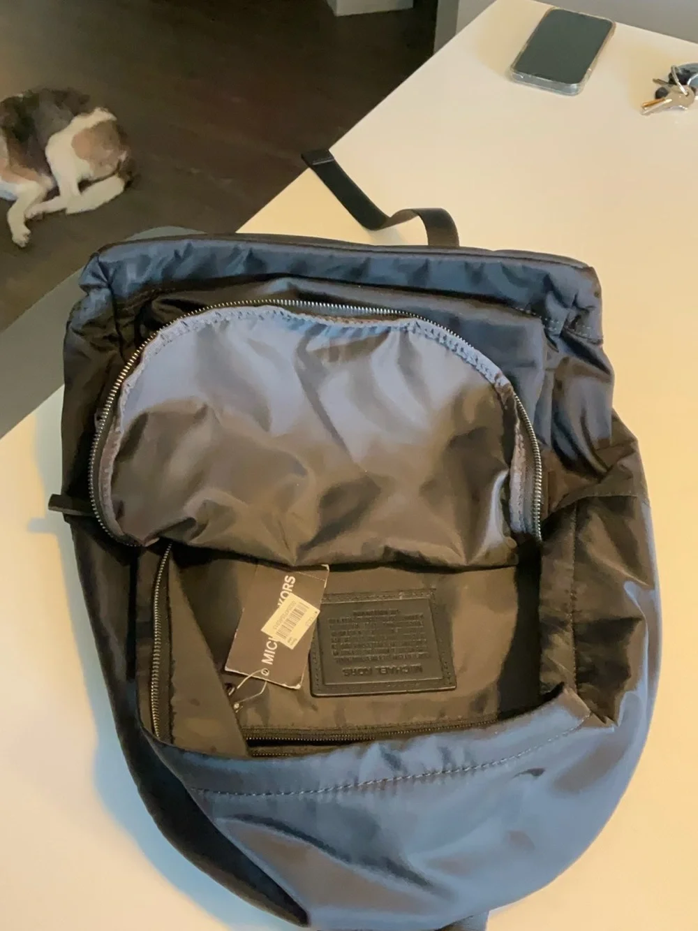 Black Michael Kors Kent Backpack. Silver hardware